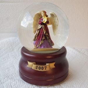 Angel Snow Globe.  This globe is a Limited Edition collector's item.  Dimensions